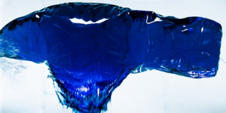 This image shows a imploding water bottle for the exhibition "Engineering meets Art".
