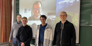 The image shows Norbert Kockmann, Hendrik Borgelt, and Alexander Behr with two guest researchers from the Czech Technical University