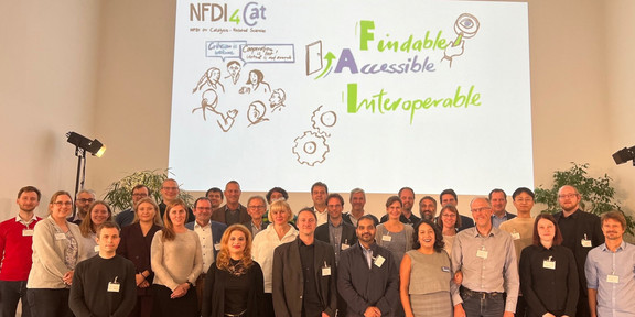 The image shows a group of people which are commited to NFDI4CAT. From the Laboratory of Equipment Design Alexander Behr, Hendrik Borgelt and Norbert Kockmann are shown.