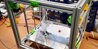The image shows the construction of an automated dosage system (ADoS).