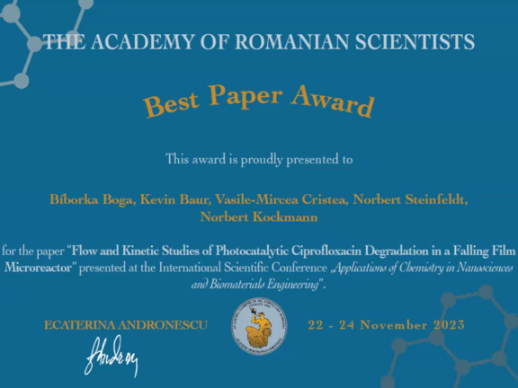 The image shows the Best Paper Award