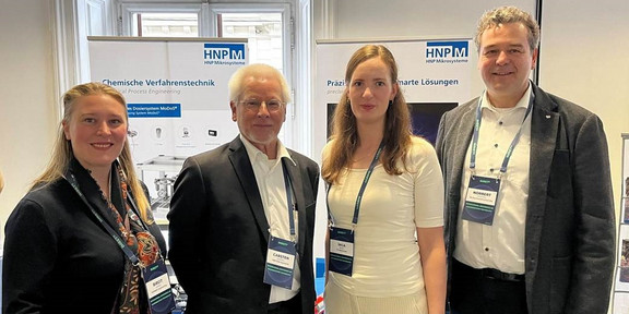 The picture shows Professor Norbert Kockmann and Inga Burke with partners from HNPM.