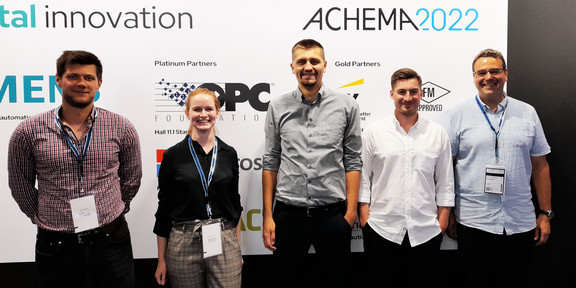 The image shows the Jonas Oeing, Laura Neuendorf, Stefan Höving, Aljoscha Frede and Norbert Kockmann @ Achema 2022.