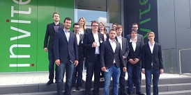 The image shows a group of people on an excursion to Invite 2015.